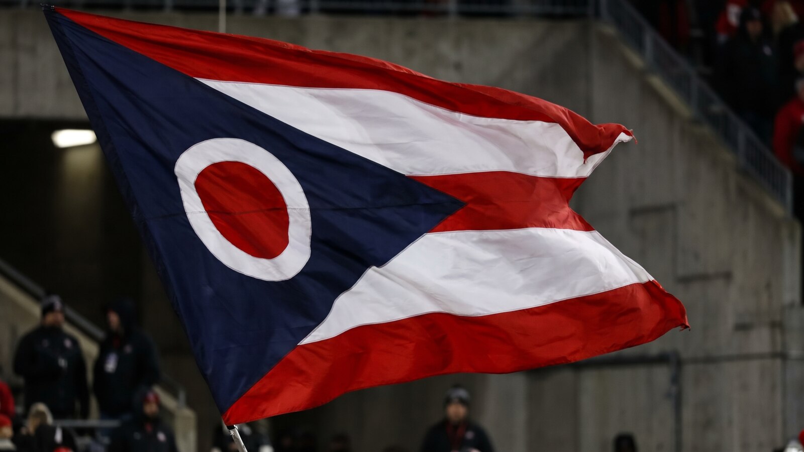 Ohio flag in a stadium setting