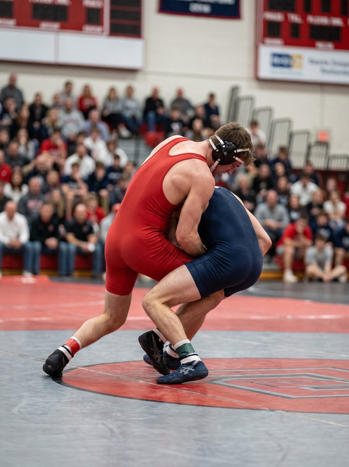 Ohio State wrestler executing a takedown